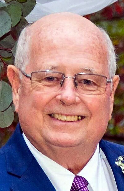 Larry Howard, Senior Vice President and General Manager A photo of Larry Howard smiling.
